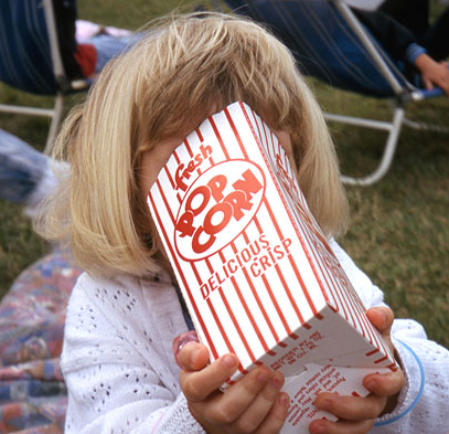 girl_stuffing_face_popcorn.png