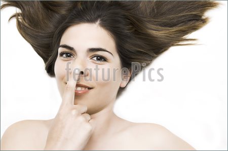 Young-Woman-Finger-Touching-Nose-236760.jpg